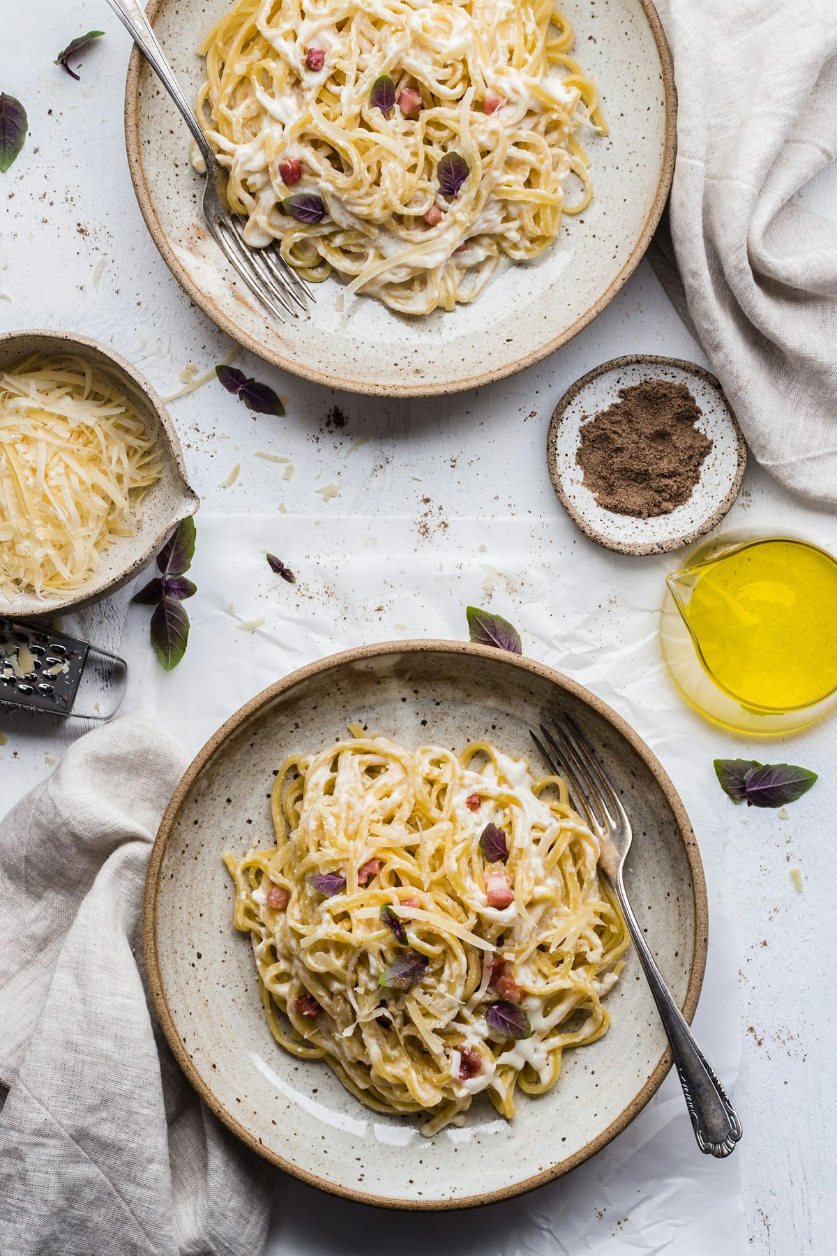 A table of shared pasta dishes (stock photo placeholder)