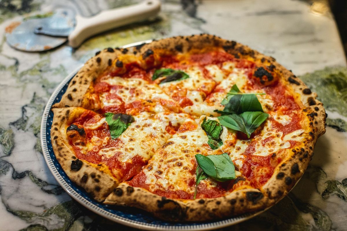Pizza Margarita Style (stock photo placeholder)
